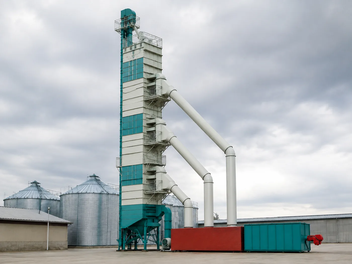 Integrated grain drying tower with steel silo storage — the drying and storage configuration supplied by AmGrainTech